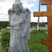 Ангел из гранита на Южном кладбище в Киеве. Фото ангела со свечей на могиле. заказать скульптуру ангела из гранита, можно в офисе ЧП Прядко по ул. Стеценко, 18.