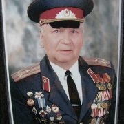 Цветной портрет военного на керамике; фото в размере 30 х 40 см. Цена цветного  портрета для памятника 1600 грн.