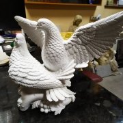 Фото скульптуры голубей. Цена голубя для памятника - доступна.