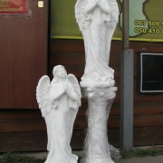 Скульптури янголів.52