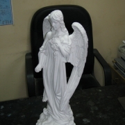Скульптури янголів.90