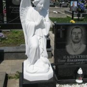 Скульптури янголів.20